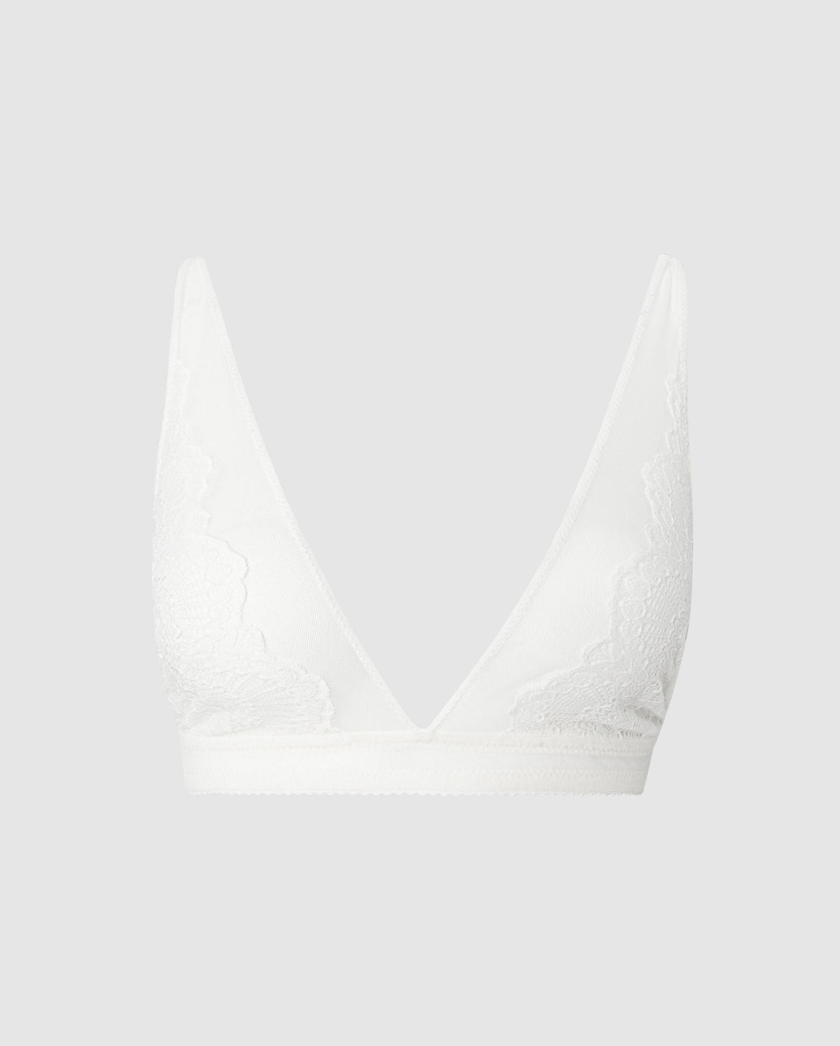 An lace plunge bralette in off white.