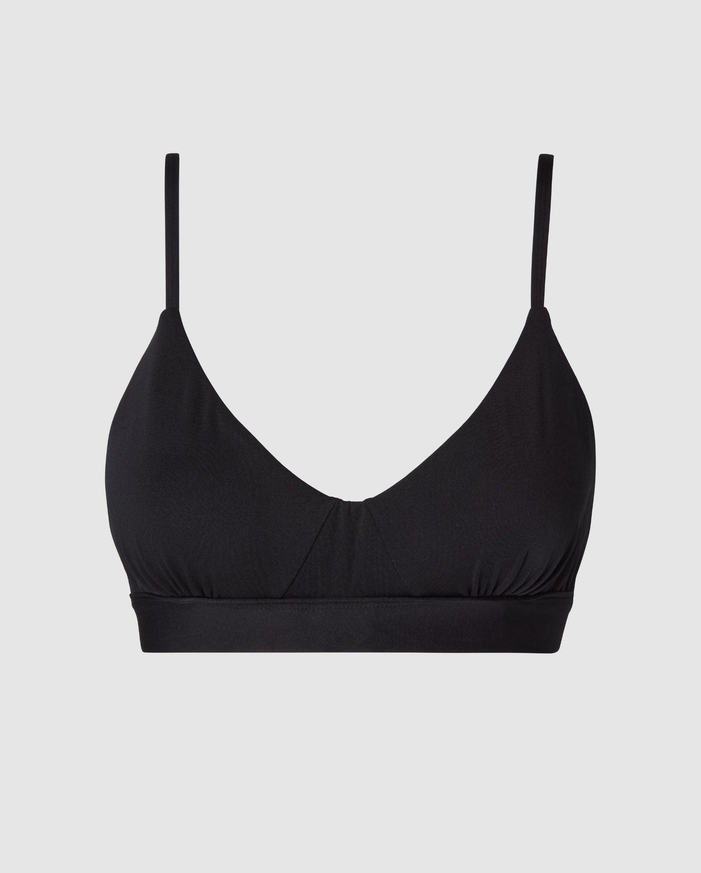 An medium cover scoop bralette with an black design.  
