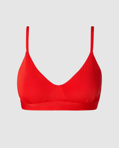 An medium cover scoop bralette with an red design.  